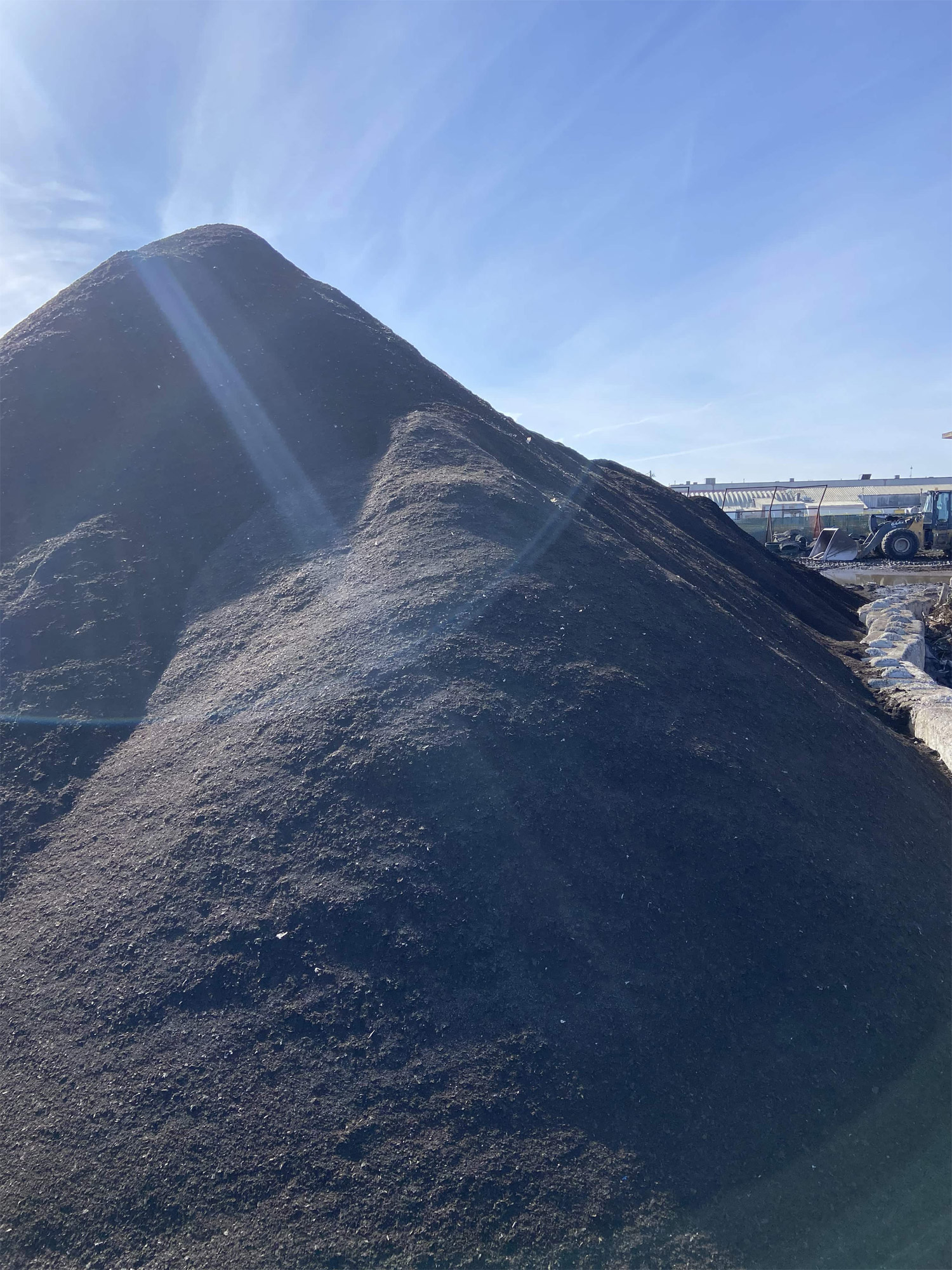 A pile of recycled asphalt shingle