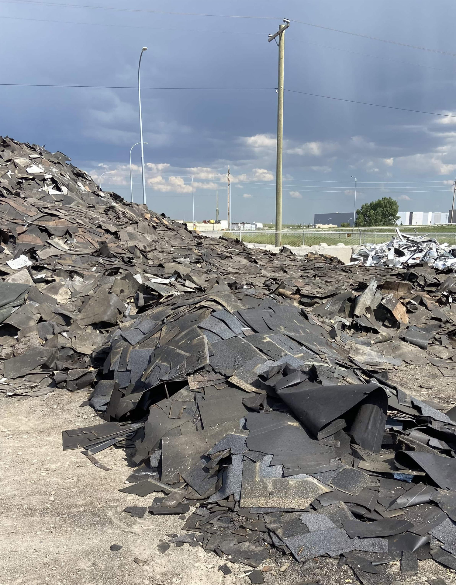 A load of tear-off asphalt shingles